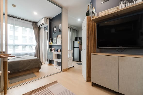 bedroom and living room of Lumpini Ville On Nut