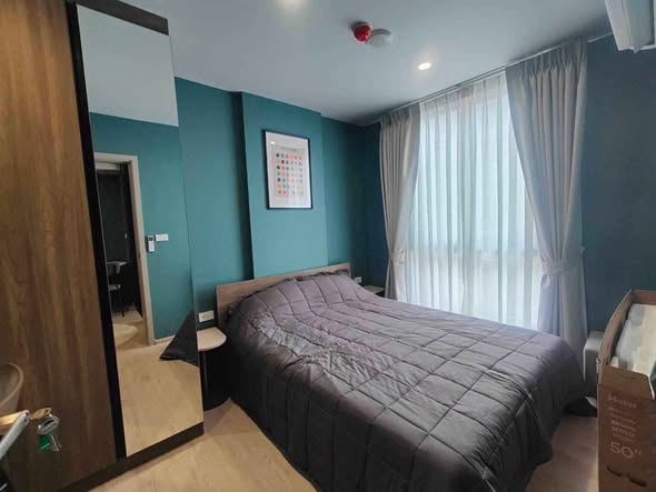 bedroom of Nue Cross Khu Khot Station (นิว ครอส คูคต สเตชัน)