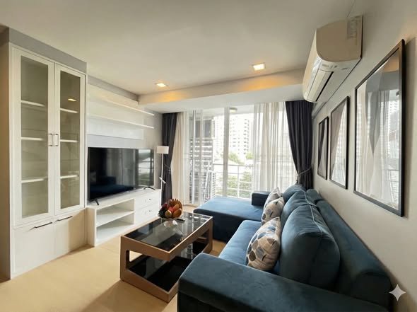 bedroom and living room of The Alcove 49