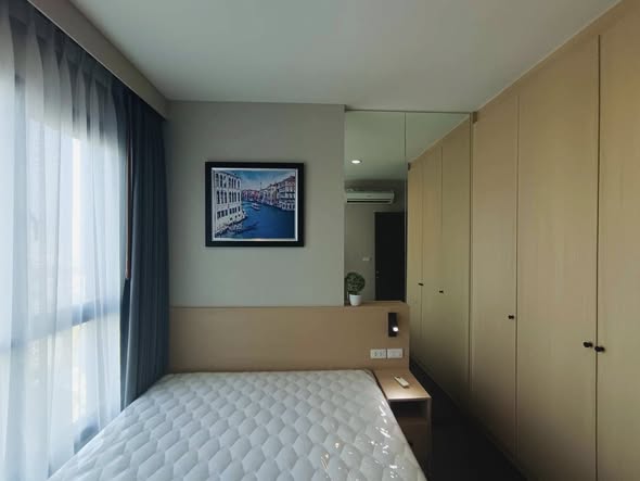 bedroom and room interior of THE BASE Sukhumvit 77