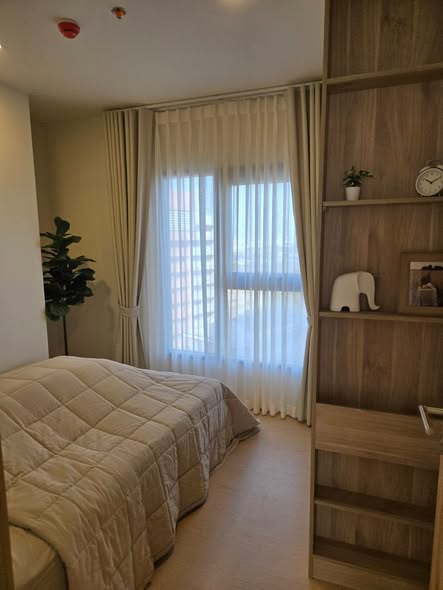 bedroom of The Base Urban Rama9