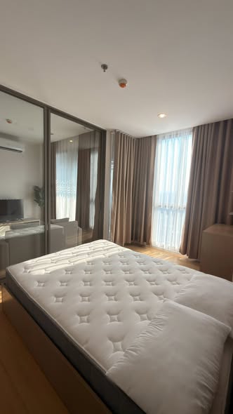 bedroom of The Cuvee Tiwanon