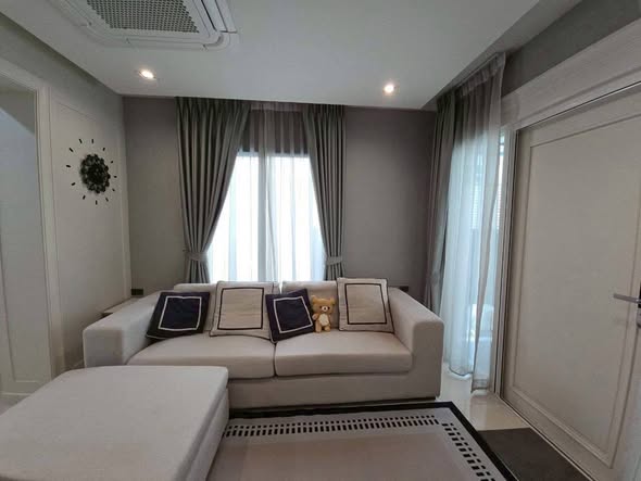 living room and bedroom of The Landmark เอกมัย รามอินทรา