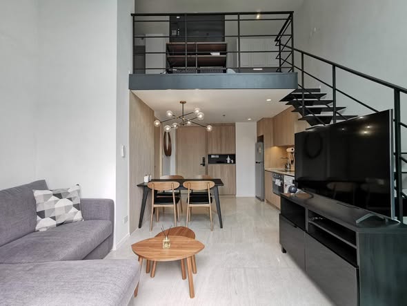 living room of The Lofts Silom by Raimon Land