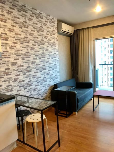 bedroom and living room of The Parkland Phetkasem Condominium