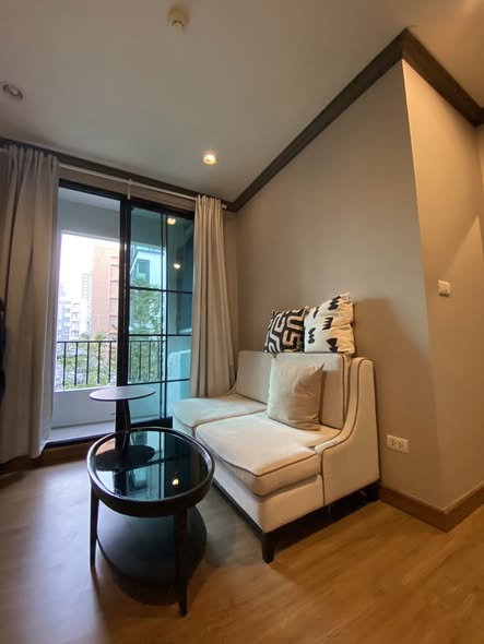 bedroom and living room of The Reserve Kasemsan 3