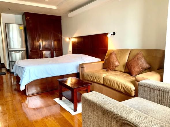 bedroom of The Trendy Condominium