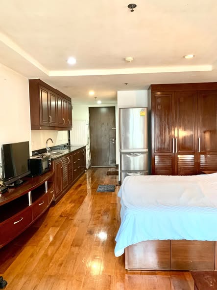 bedroom of The Trendy Condominium