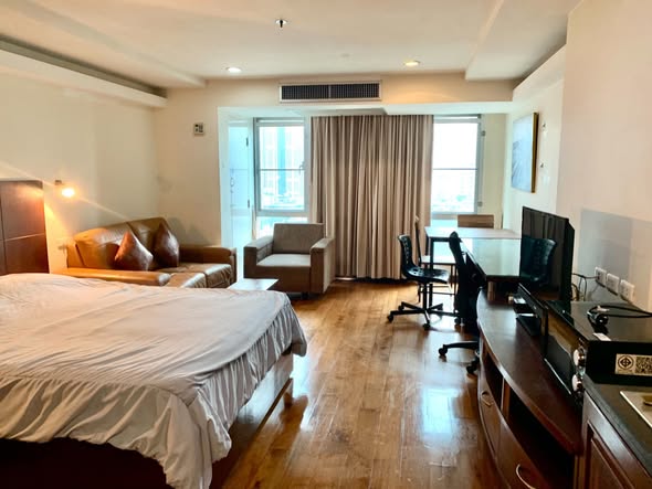 bedroom of The Trendy Condominium