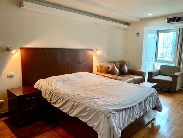 bedroom of The Trendy Condominium