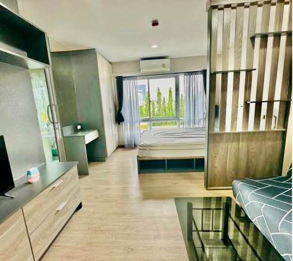 bedroom and room interior of BE Condo