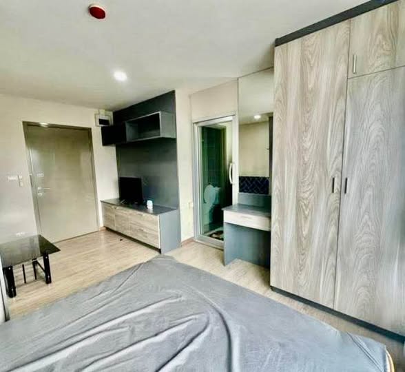 bedroom and room interior of BE Condo