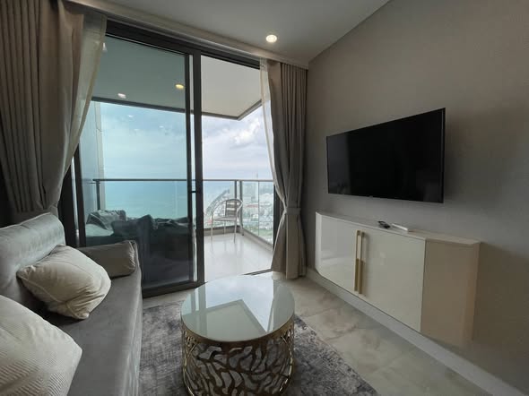 living room and bedroom of Copacabana Beach Jomtien