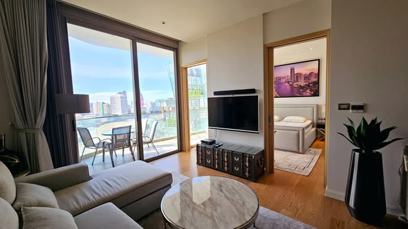 bedroom and living room of Magnolias Waterfront Residences