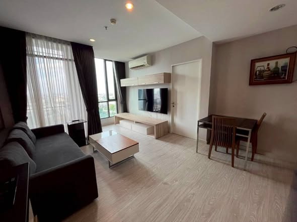 living room and bedroom of Mövenpick Ekkamai Bangkok