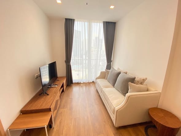 bedroom and living room of Noble BE33