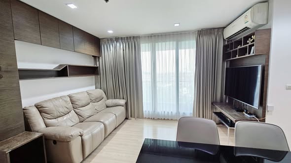 living room and bedroom of RHYTHM Phahon-Ari