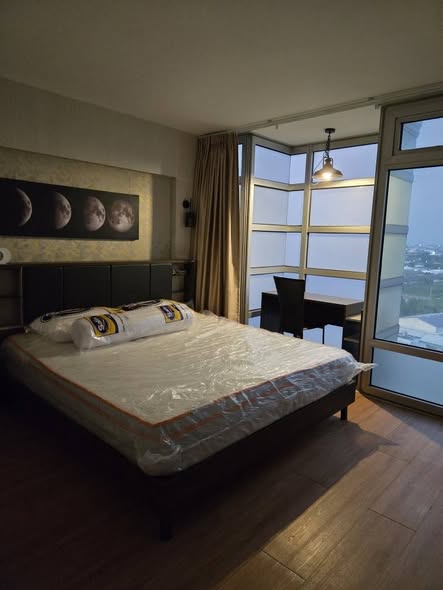 bedroom of Riviera Condominium