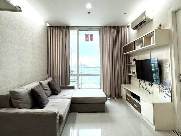 living room and bedroom of TC-Green Condominium