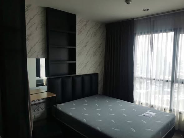 bedroom of THE BASE Park West – Sukhumvit 77