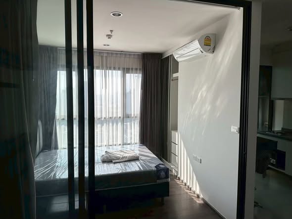 bedroom and room interior of THE BASE Park West – Sukhumvit 77