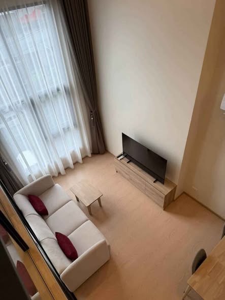 bedroom and living room of The Base Urban Rama9