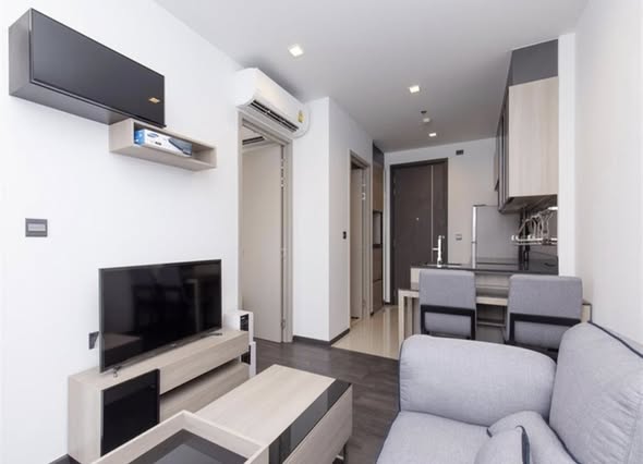 living room and kitchen of THE LINE Asoke-Ratchada