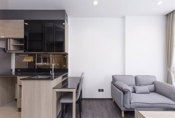 living room and kitchen of THE LINE Asoke-Ratchada