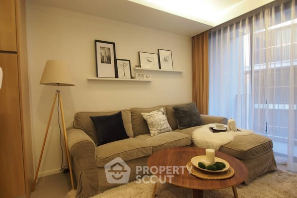 living room and bedroom of The Nest Ploenchit