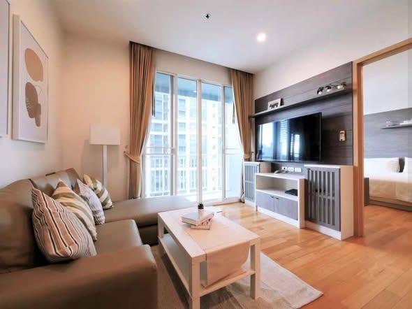 bedroom and living room of 39 by Sansiri