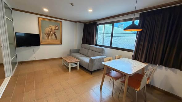 bedroom and living room of 98 Wireless