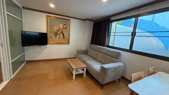 bedroom and living room of 98 Wireless