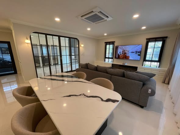 living room and kitchen of Centro Bangna-Srinakarin