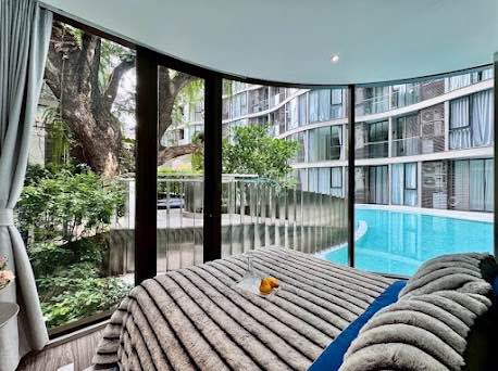 pool and bedroom and room interior of Fynn Asoke