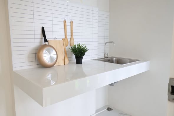 bathroom and kitchen of i-House Laguna Garden RCA – Building A (Blue)