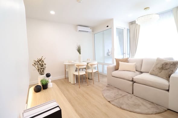 bedroom and living room of i-House Laguna Garden RCA – Building A (Blue)