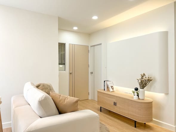 living room and room interior of i-House Laguna Garden RCA – Building A (Blue)