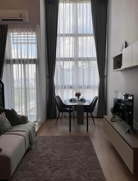 living room and bedroom of IDEO Rama9 – Asoke