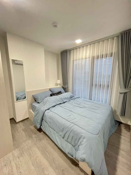 bedroom of Kave Wonderland Sales Gallery