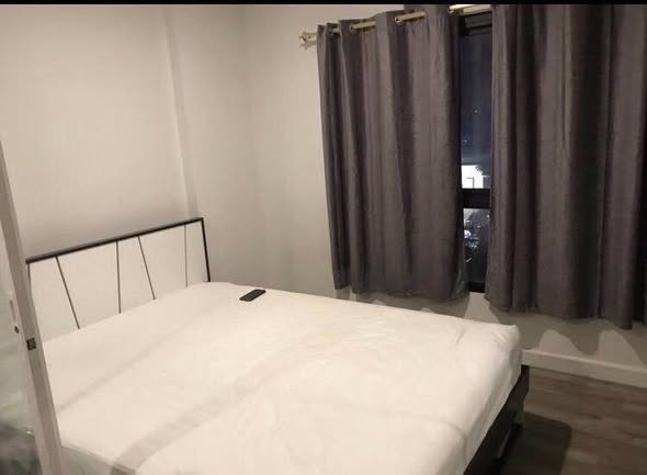 bedroom of Library Houze Condo