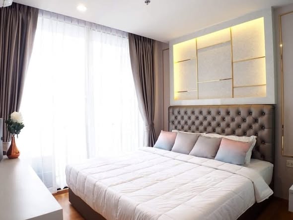 bedroom of Noble Revo Silom