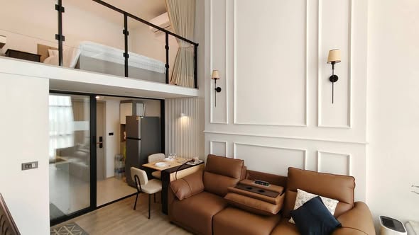 living room and bedroom of Origin Plug & Play Sirindhorn Station