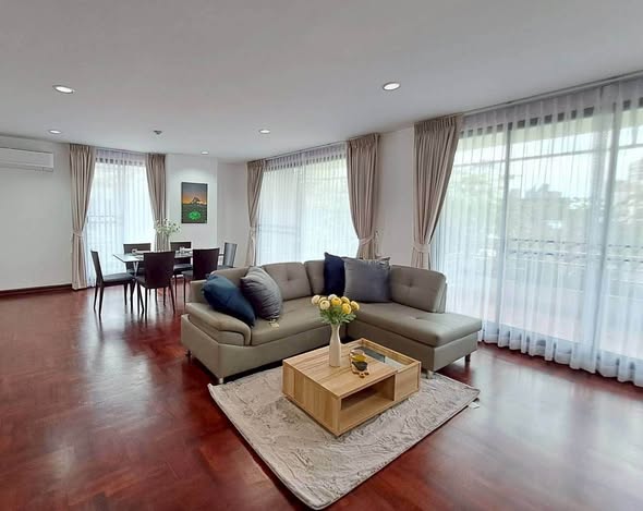 bedroom and living room of PR COURT APARTMENT