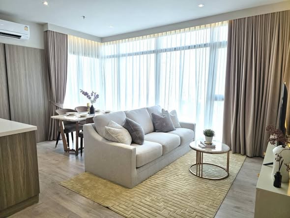 bedroom and living room of Rhythm Ekkamai Estate