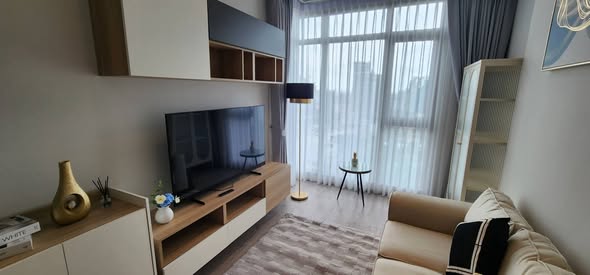 living room and bedroom of Rhythm Ekkamai Estate