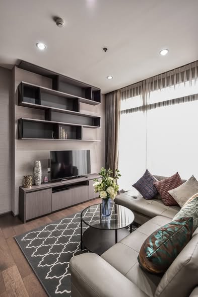 living room and bedroom of The Diplomat Sathorn