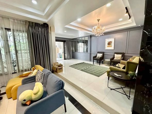 living room and bedroom of The Editor Saphan Khwai
