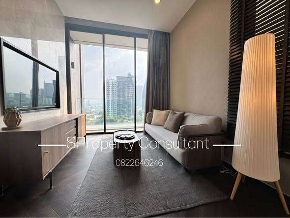 living room and bedroom of THE ESSE Sukhumvit 36