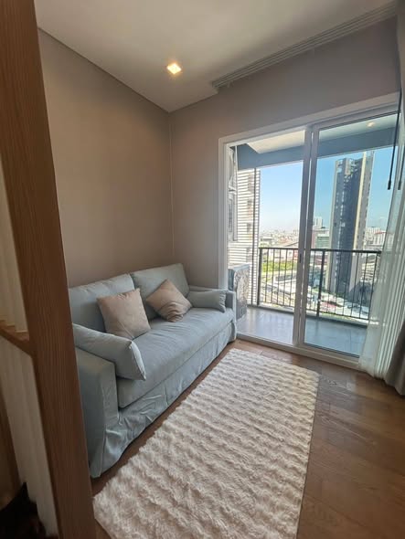 living room and bedroom of The Saint Residences