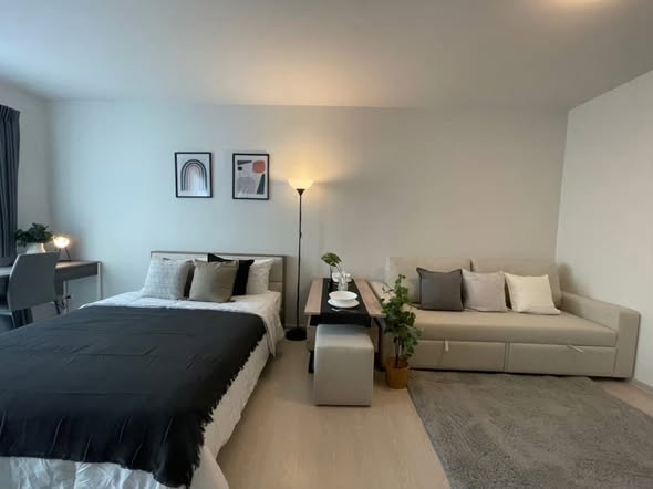 bedroom and living room of Unio Sukhumvit 72 Phase 2 Building A